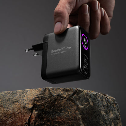 EnoVolt Pro 70W held in a hand, showing how compact the GaN charger is