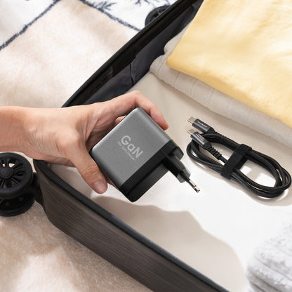 EnoVolt Pro 70W packed in a suitcase with its cable, ready to travel